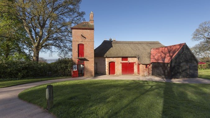 View of the barn at A la Ronde, Devon, from the car park.